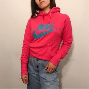 Hot pink Nike hoodie with velvety blue logo